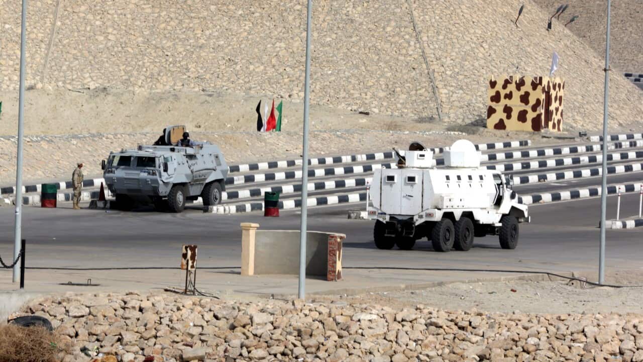 Egyptian security vehicles take up positions in northern Sinai.