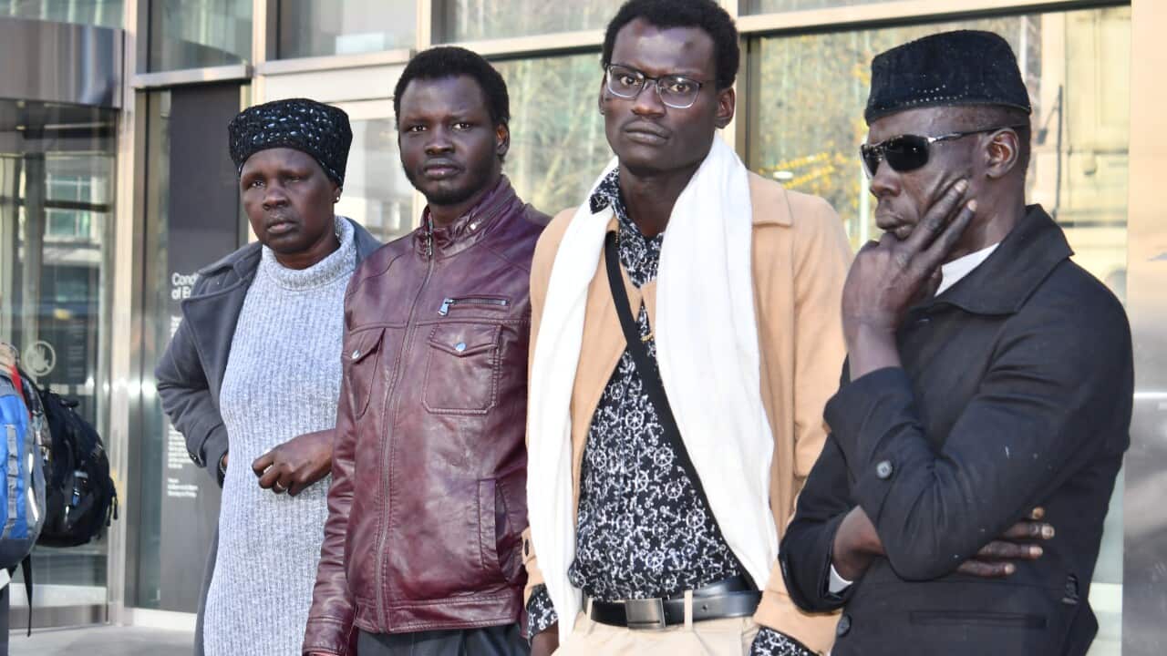 From left: Nyankot, Majok Atem, Akok Ayueil and husband Ayuel Akok today at Magistrate court