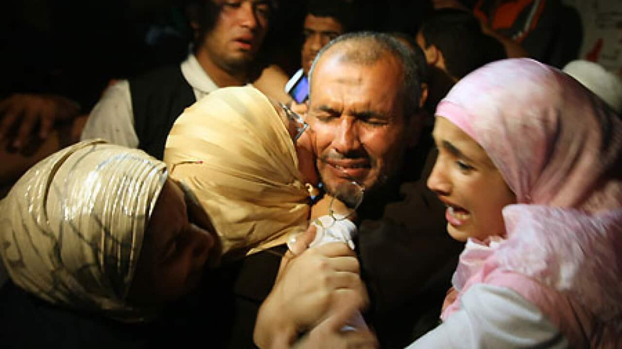 israeliraid_deported_activists_100603_afp_B_1254700729