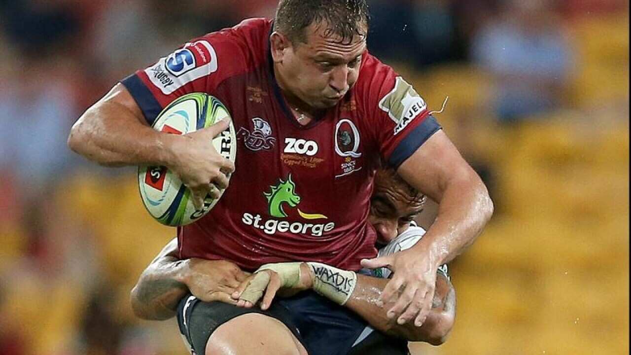 Reds player JP Smith makes a run