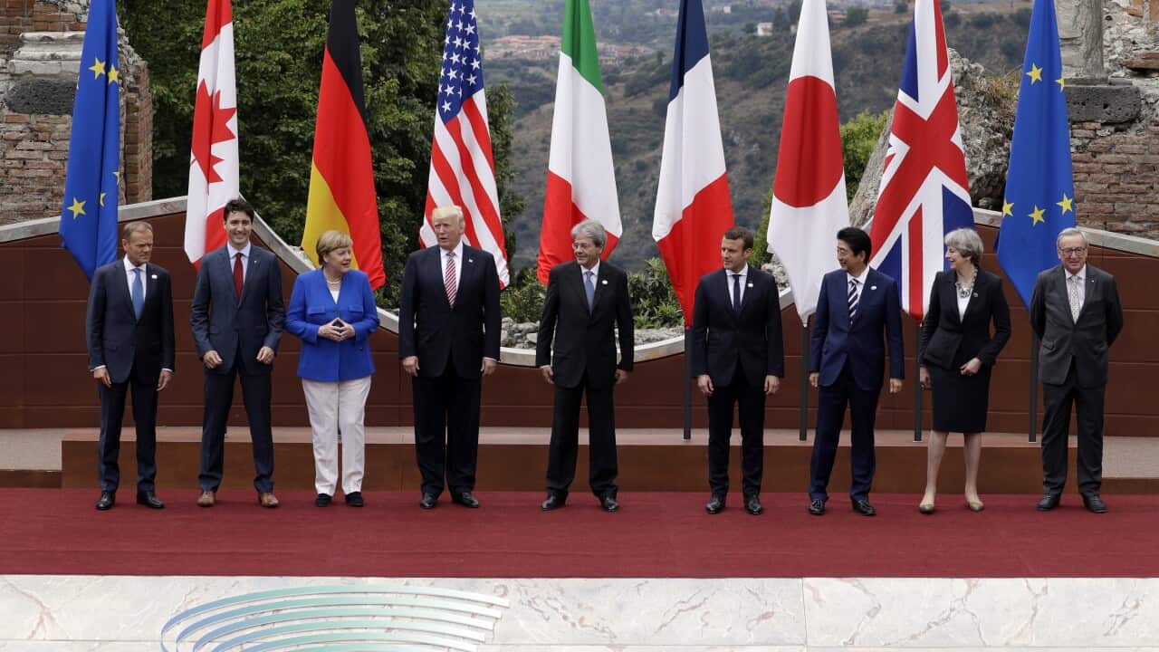 World leaders of the G7 gather for a photo opportunity during the meeting in Sicily.