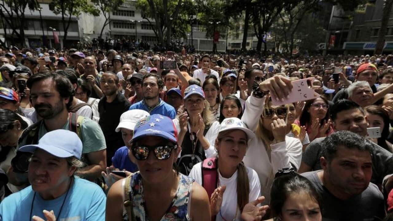 Crowds listen to Juan Guaido