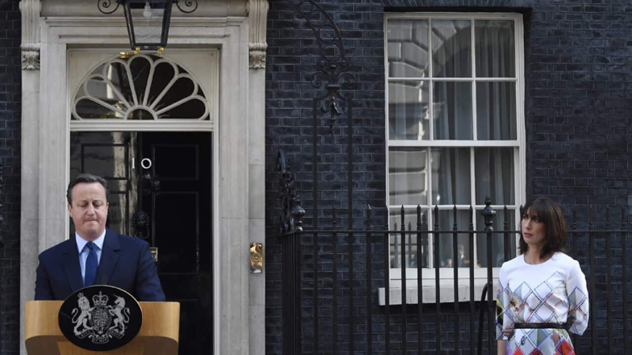 British Prime Minister David Cameron, next to his wife Samantha