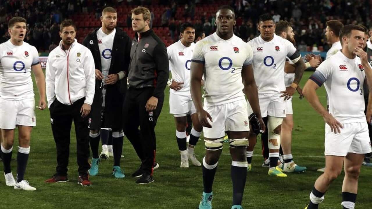England rugby players following their loss to South Africa