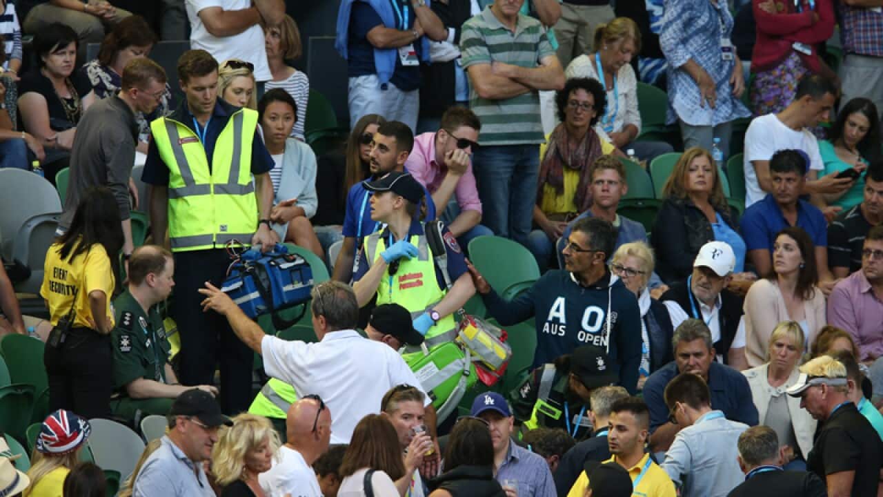 Play is halted due to a medical incident in the crowd