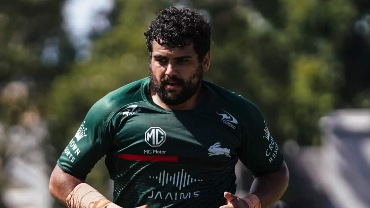Shaq Mitchell wearing a rabbitohs jersey.