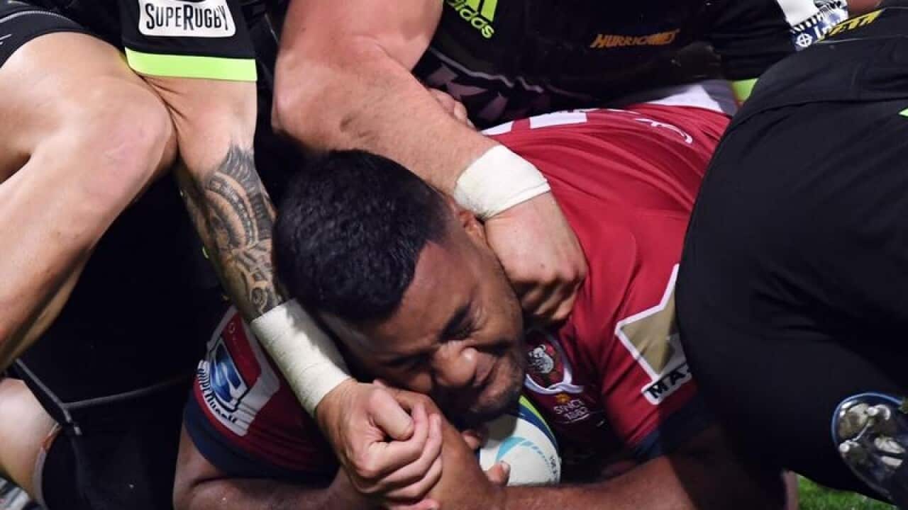 Taniela Tupou of the Reds scores a try