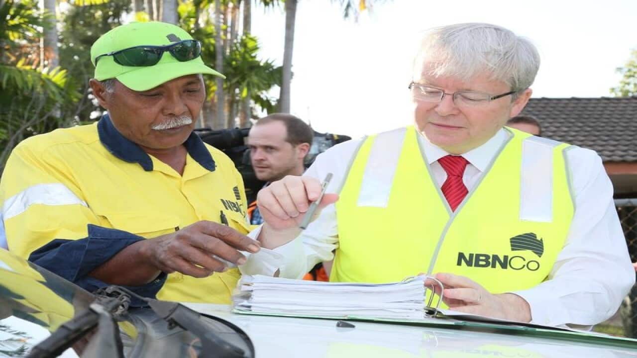 Then prime minister Kevin Rudd inspects an NBN site in 2013.