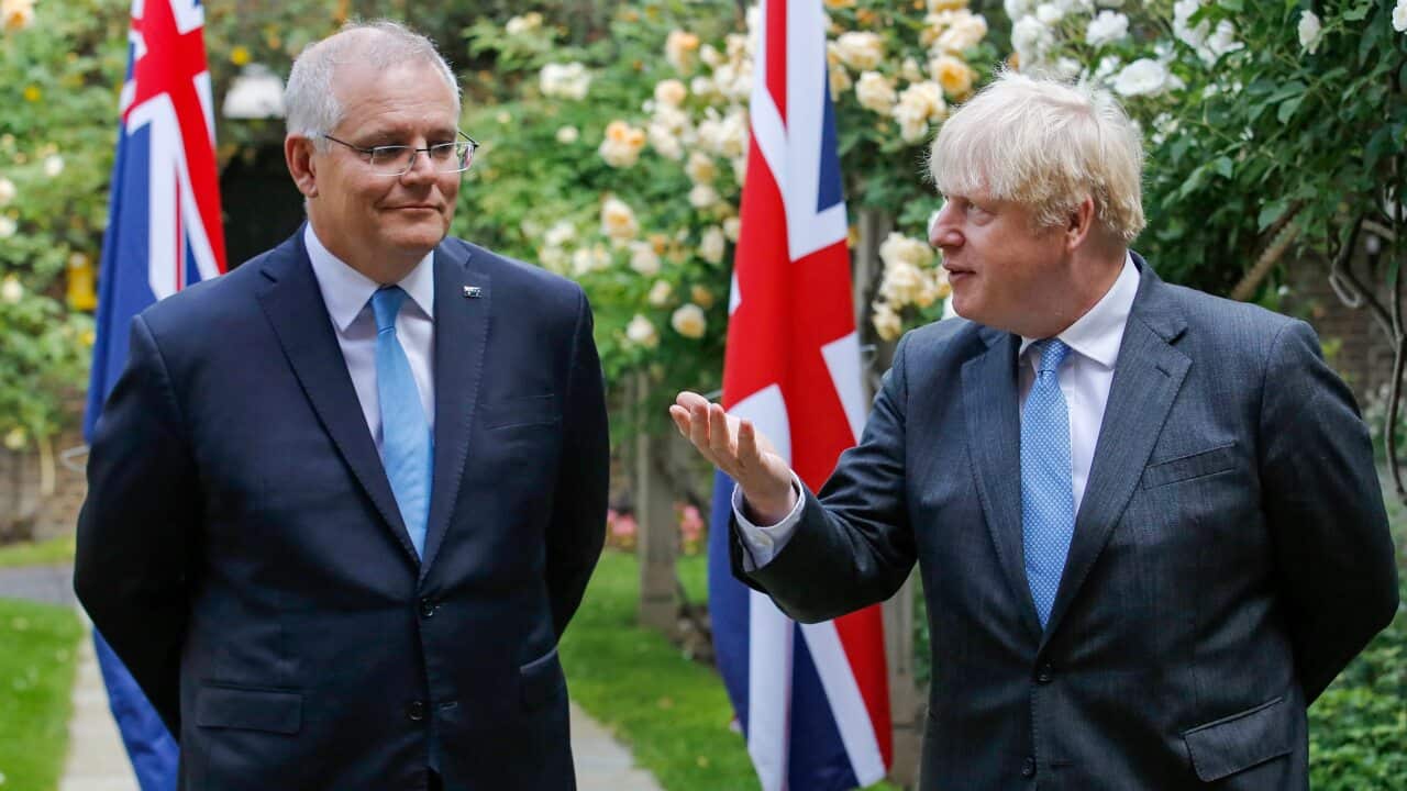 Australian Prime Minister Scott Morrison (left) and British leader Boris Johnson (right) in the garden of number 10 Downing Street in London, in 2021.