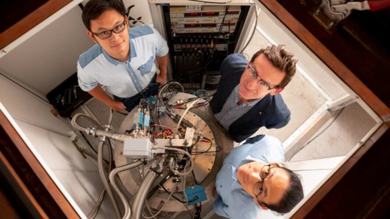 Wister Huang, a final-year PhD student in Electrical Engineering; Professor Andrew Dzurak; and Dr Henry Yang, a senior research fellow.