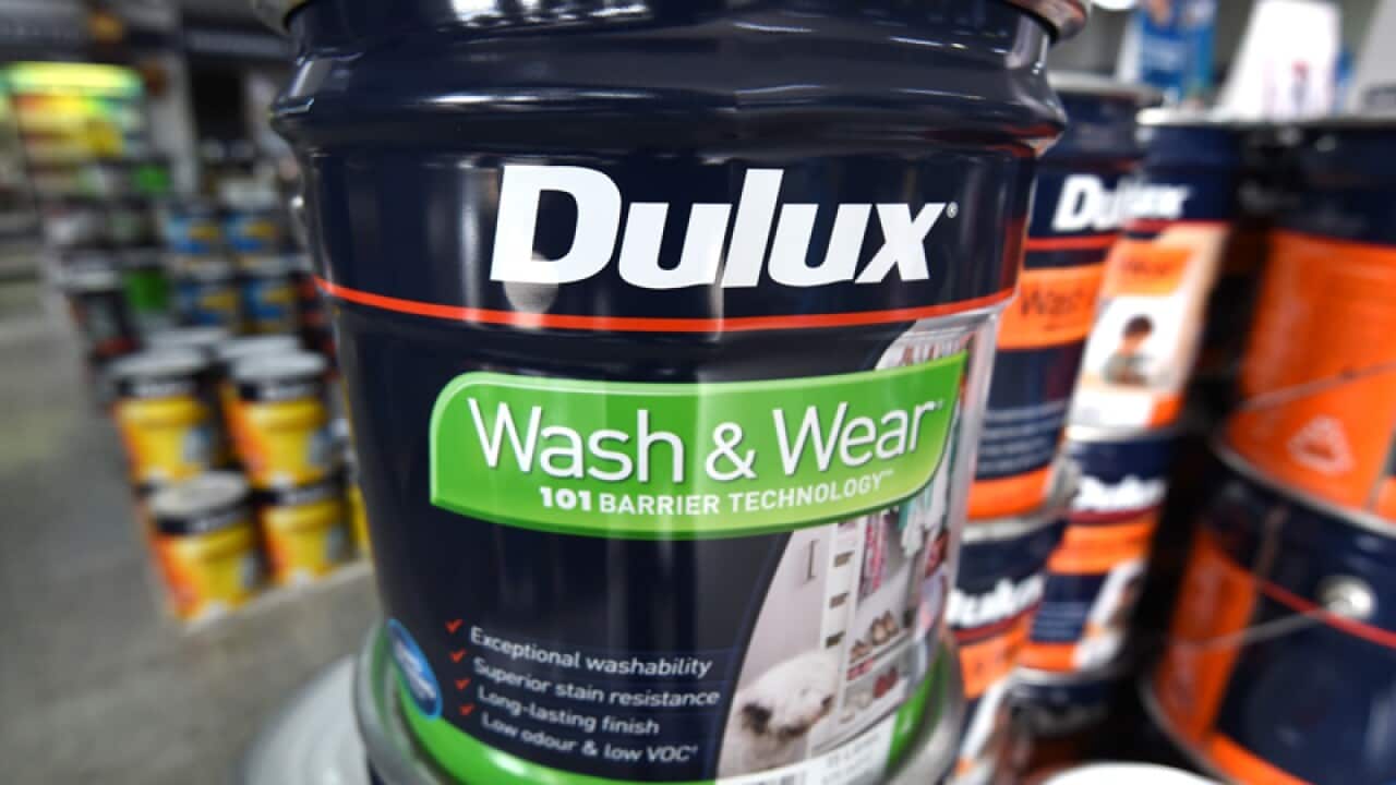Dulux paint cans are pictured at a store in Brisbane