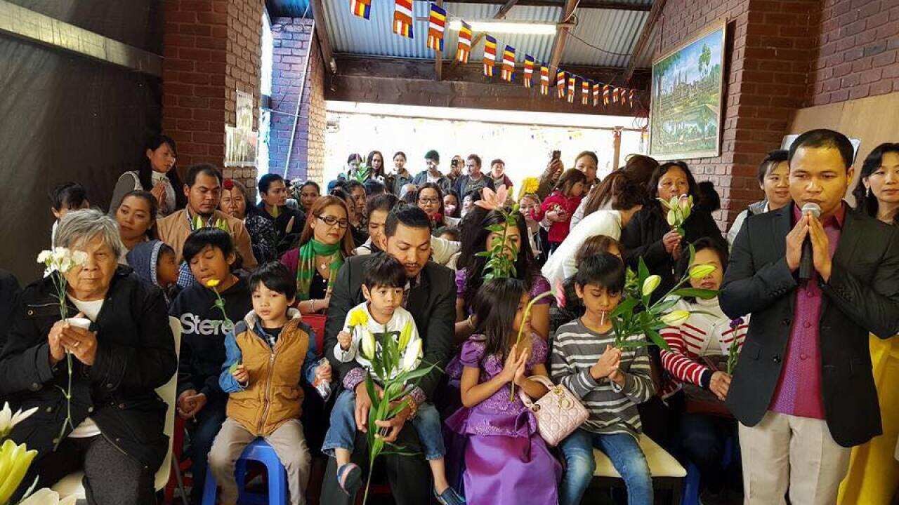 People gather in a religious ceremony