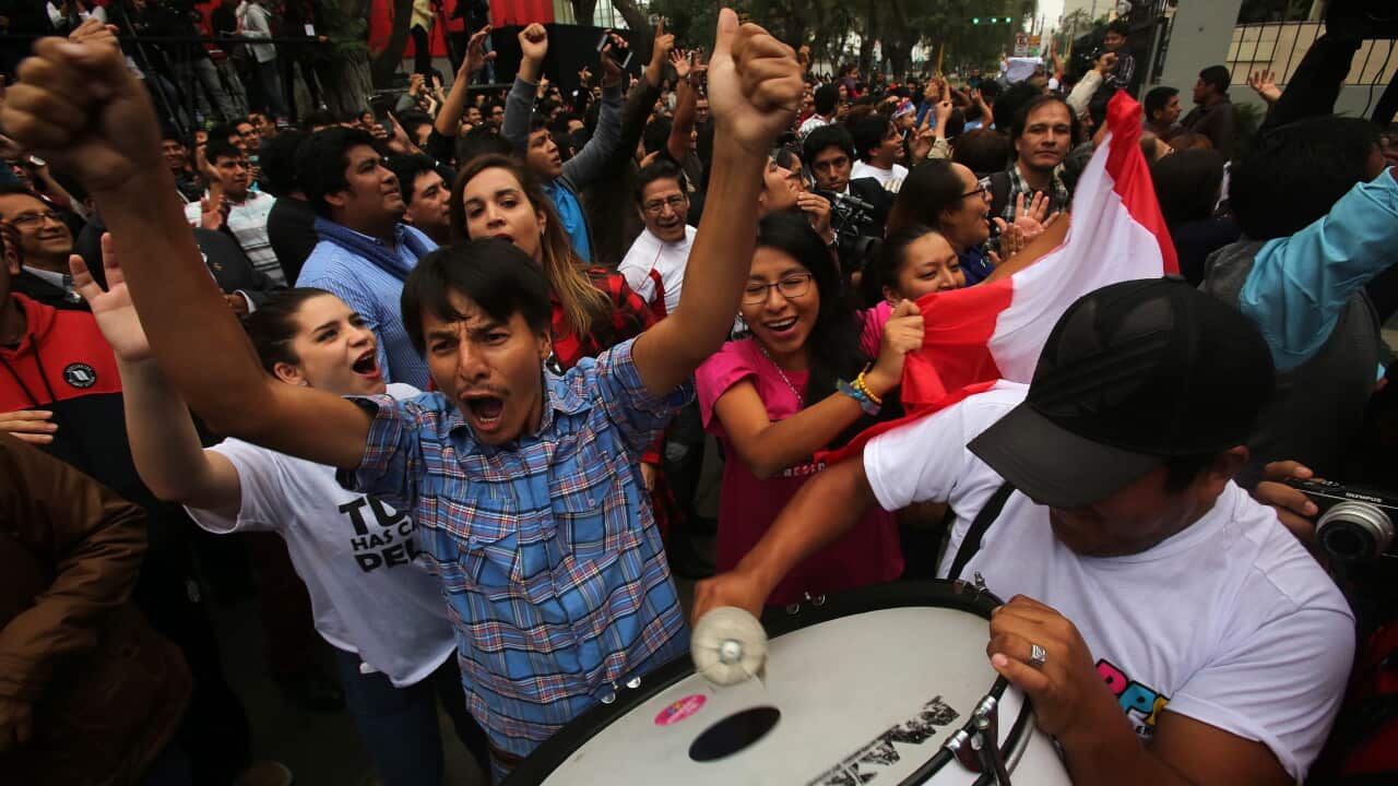 Supporters of Peruvian presidential candidate Pedro Pablo Kuczynski wait for the results of the second round of the presidential elections, in Lima, Peru