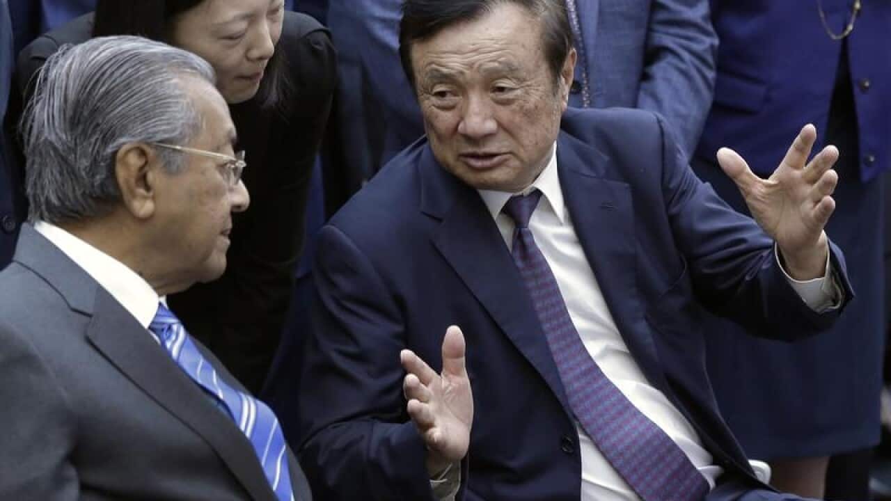 Huawei's CEO Ren Zhengfei with Malaysia's Mahathir Mohamad