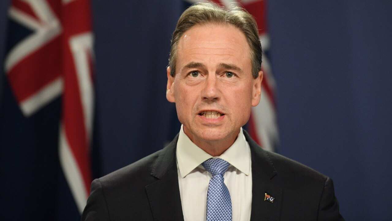 Greg Hunt is in hospital suffering from a suspected infection, although his condition is not believed to be linked to getting a COVID-19 jab.