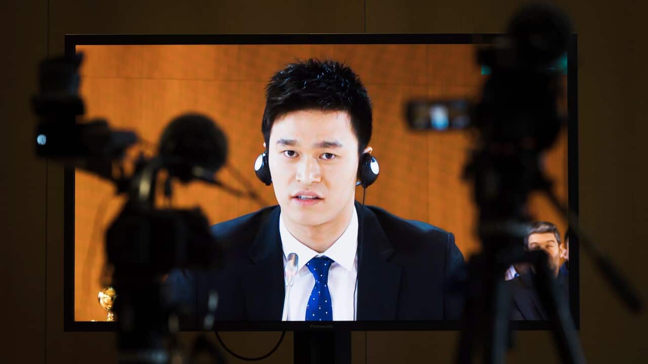 Chinese swimmer Sun Yang, is pictured on a TV screen during a public hearing at the Court of Arbitration for Sport, (CAS), in Montreux, Switzerland.