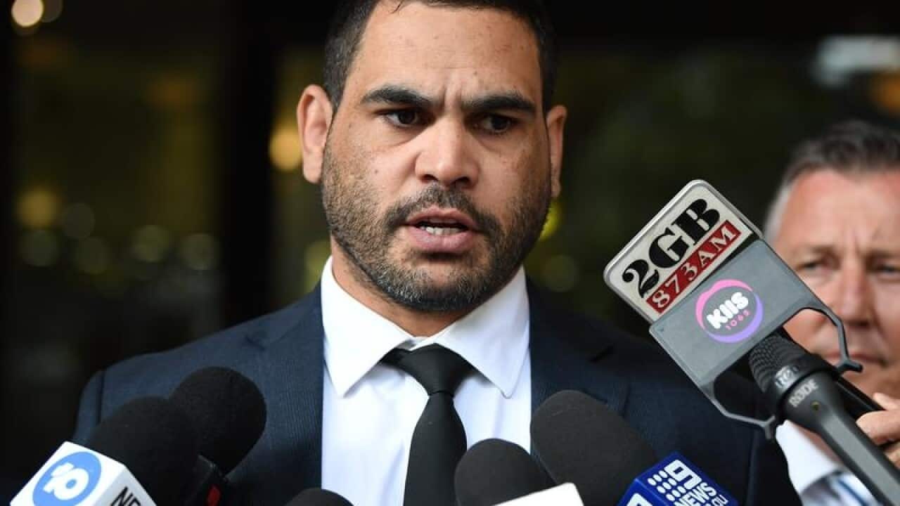 NRL player Greg Inglis speaks to the media as he leaves court