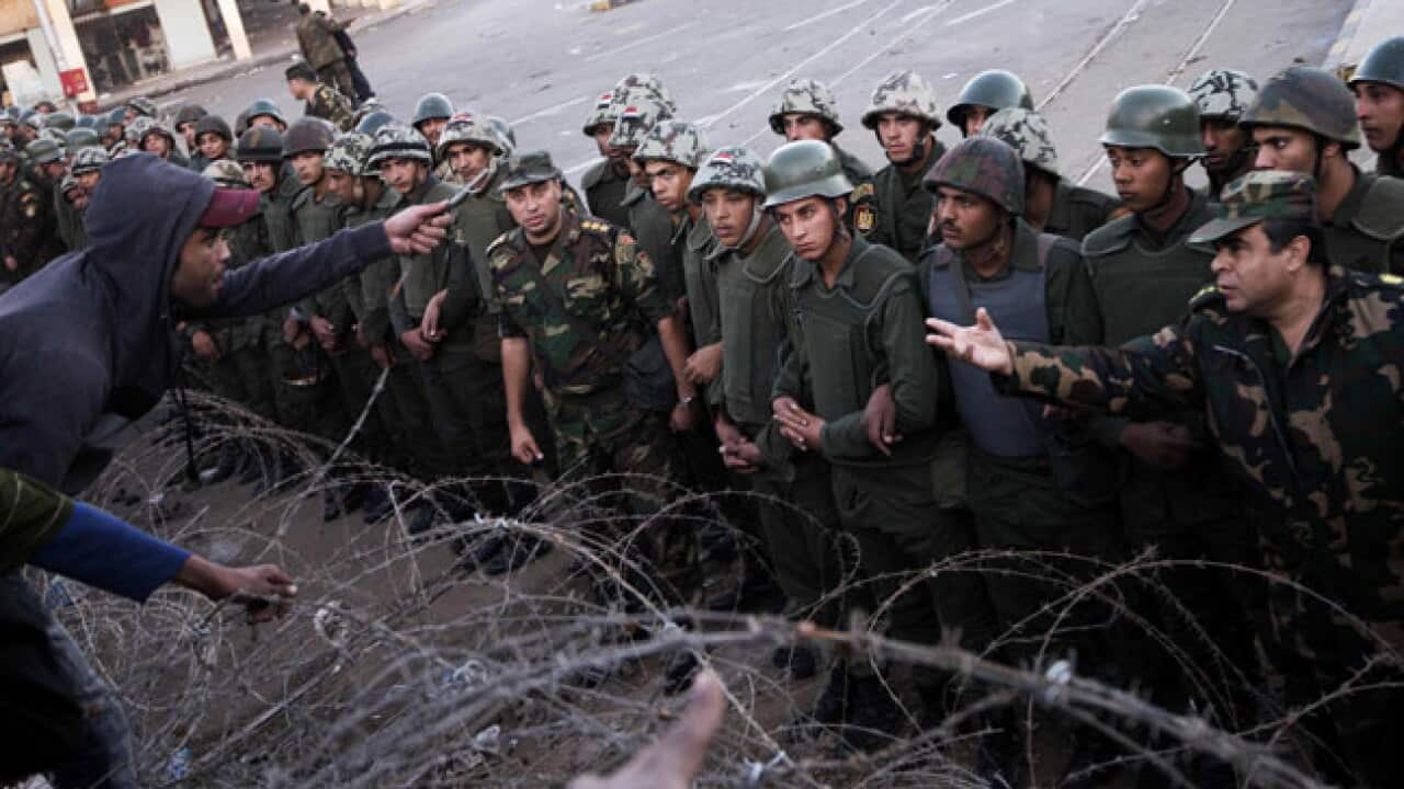 egypt_protest_palace_getty_121208_b_1411974660