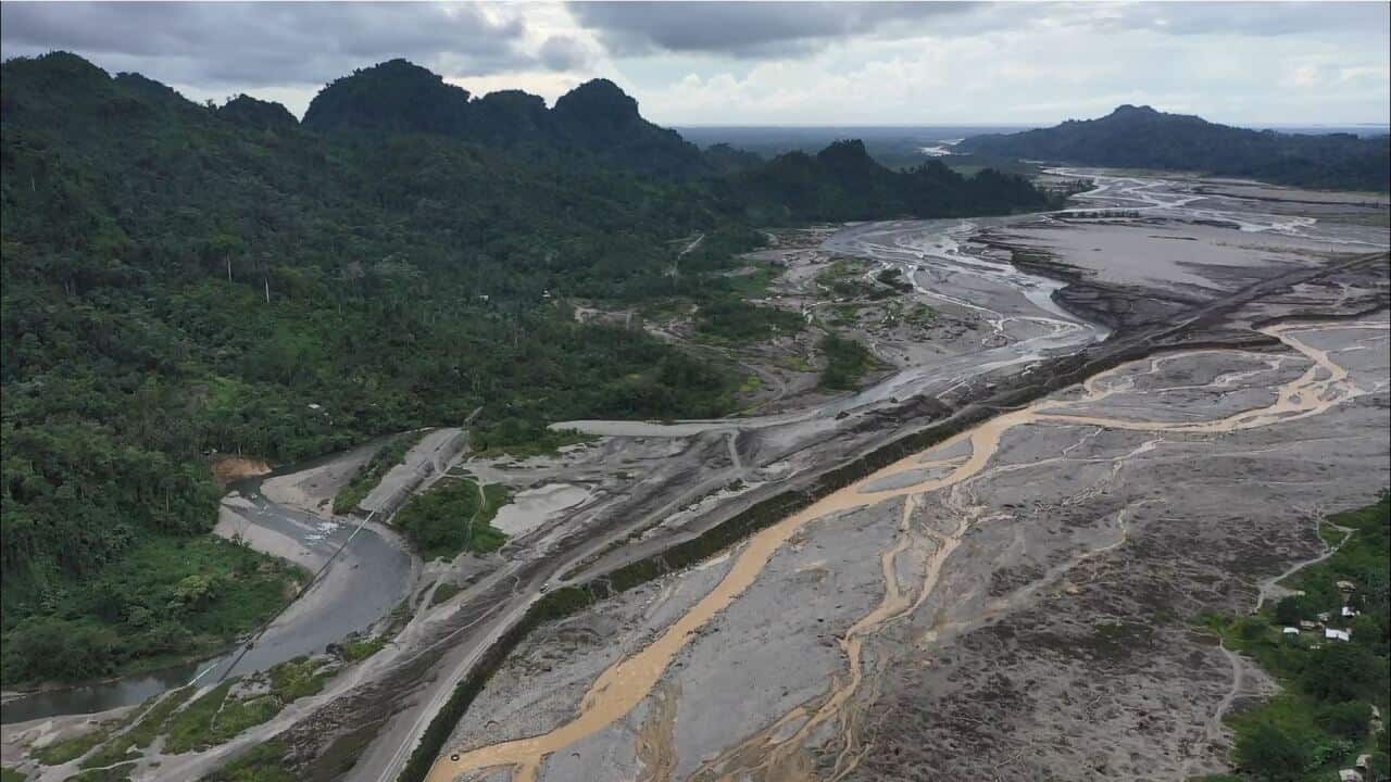 Tailings waste flowing down into the Konawiru-Jaba River delta