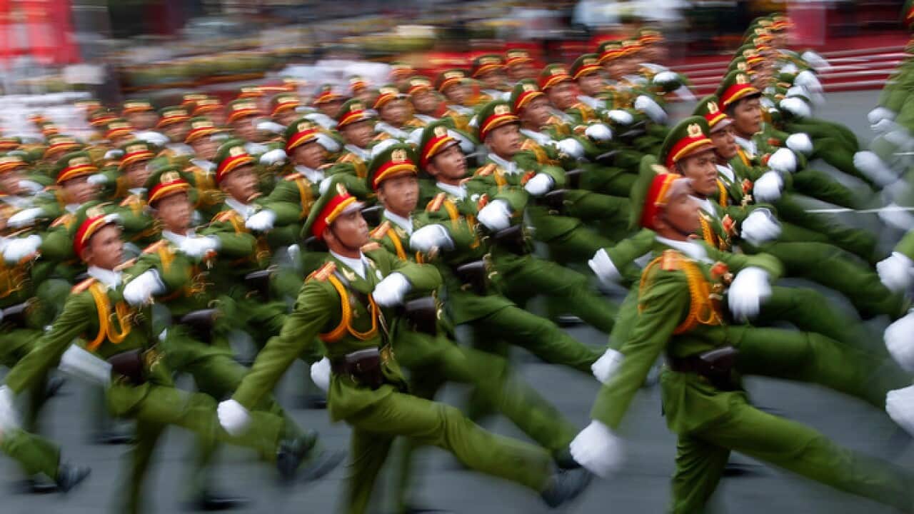 Vietnamese soldiers march in 40th-anniversary parade.