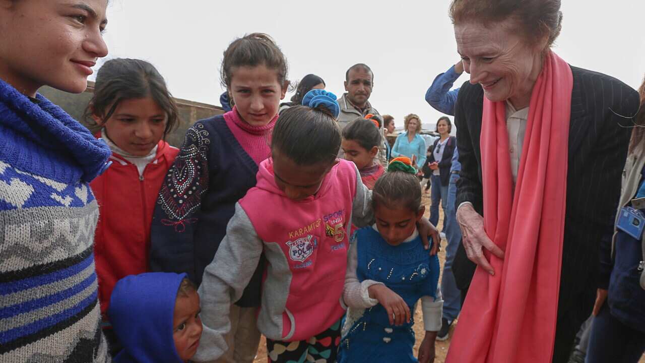 UNICEF executive director Henrietta Fore (R) meets with Syrian refugee children during a visit to Baalbek refugees camp, eastern Lebanon