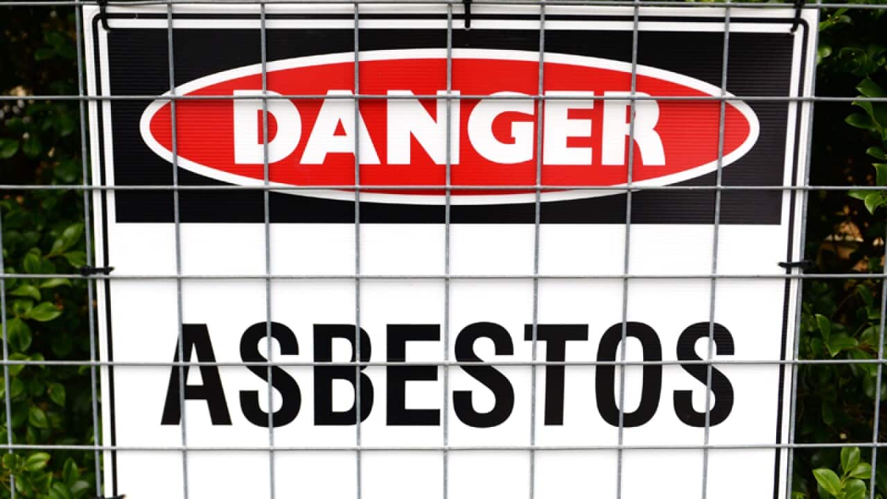 A stock image of an asbestos warning sign
