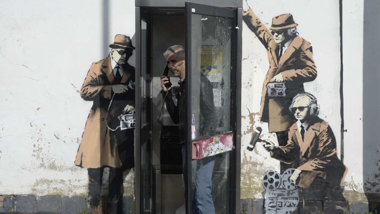 A graffito street art piece, suspected of being a Banksy