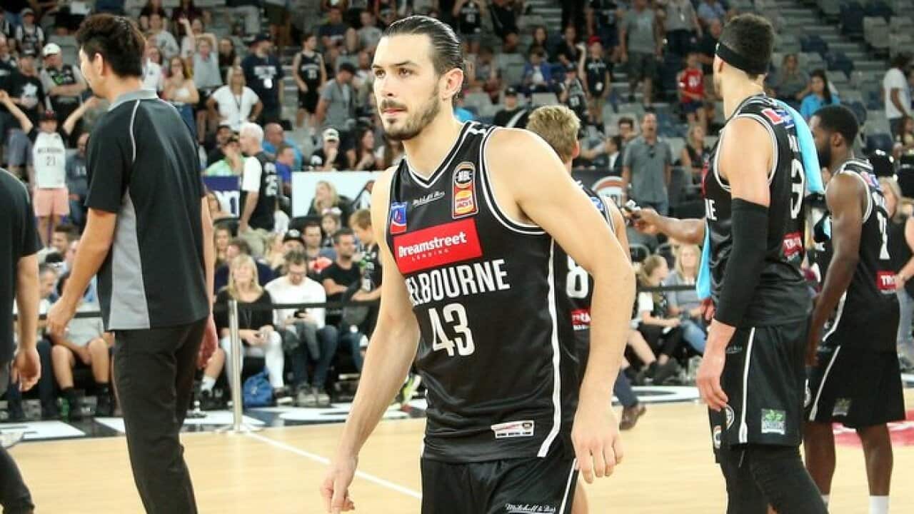 Chris Goulding of Melbourne with an injured ankle