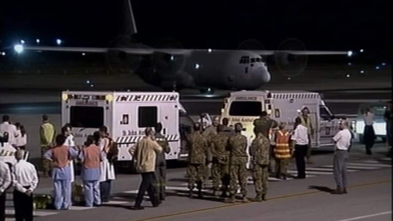 Bali bombing victims arrive in Darwin to be taken to hospital in 2002 (SBS).jpg