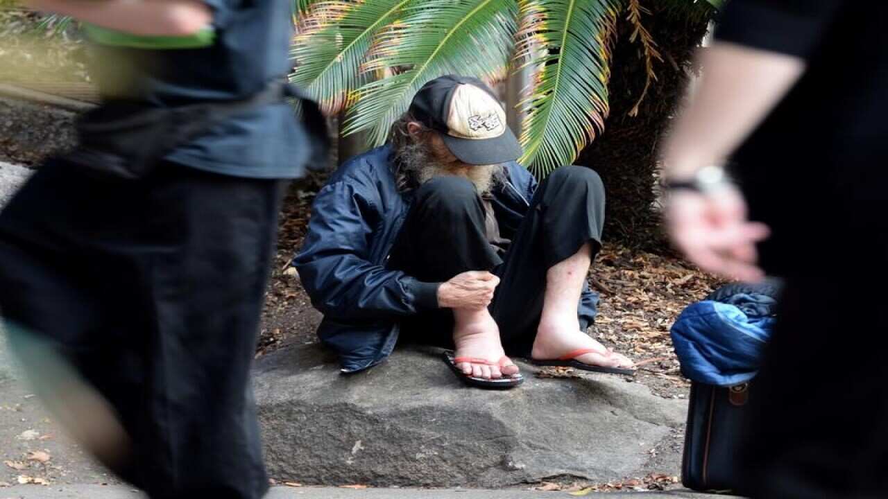 A stock image of a homeless man