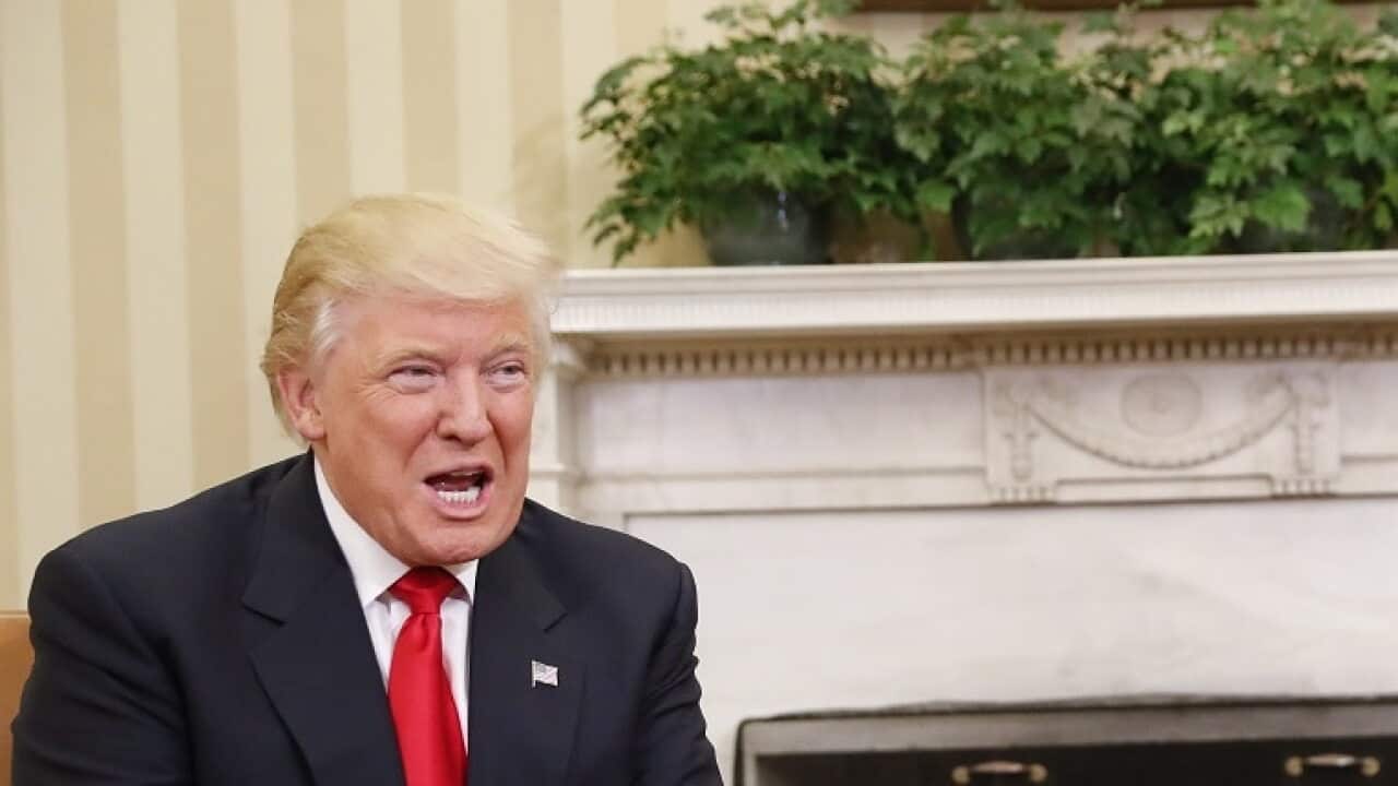 Barack Obama and Donald Trump meet.