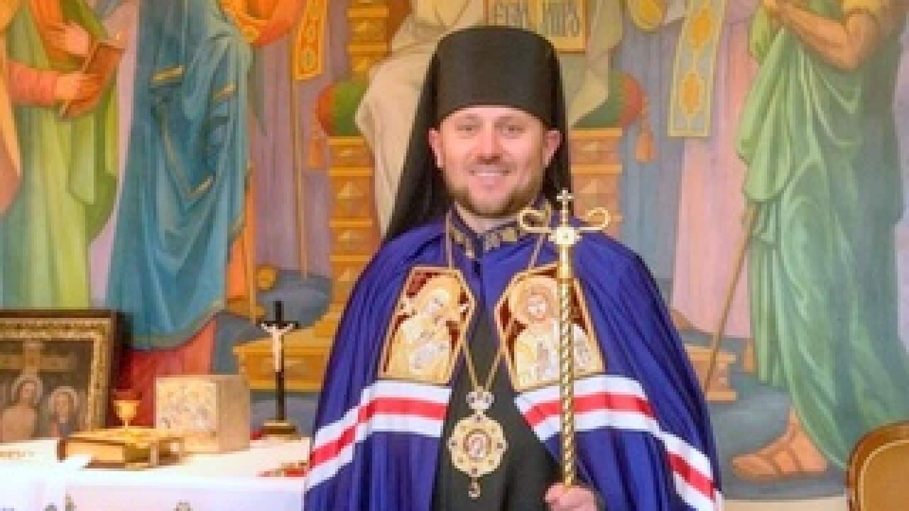 Very Rev Mykola Bychok.