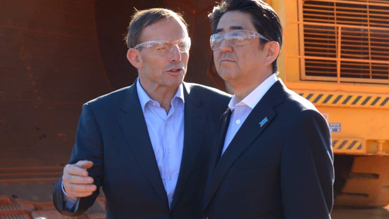 Prime Minister Tony Abbott (L) and Japanese Prime Minister Shinzo Abe