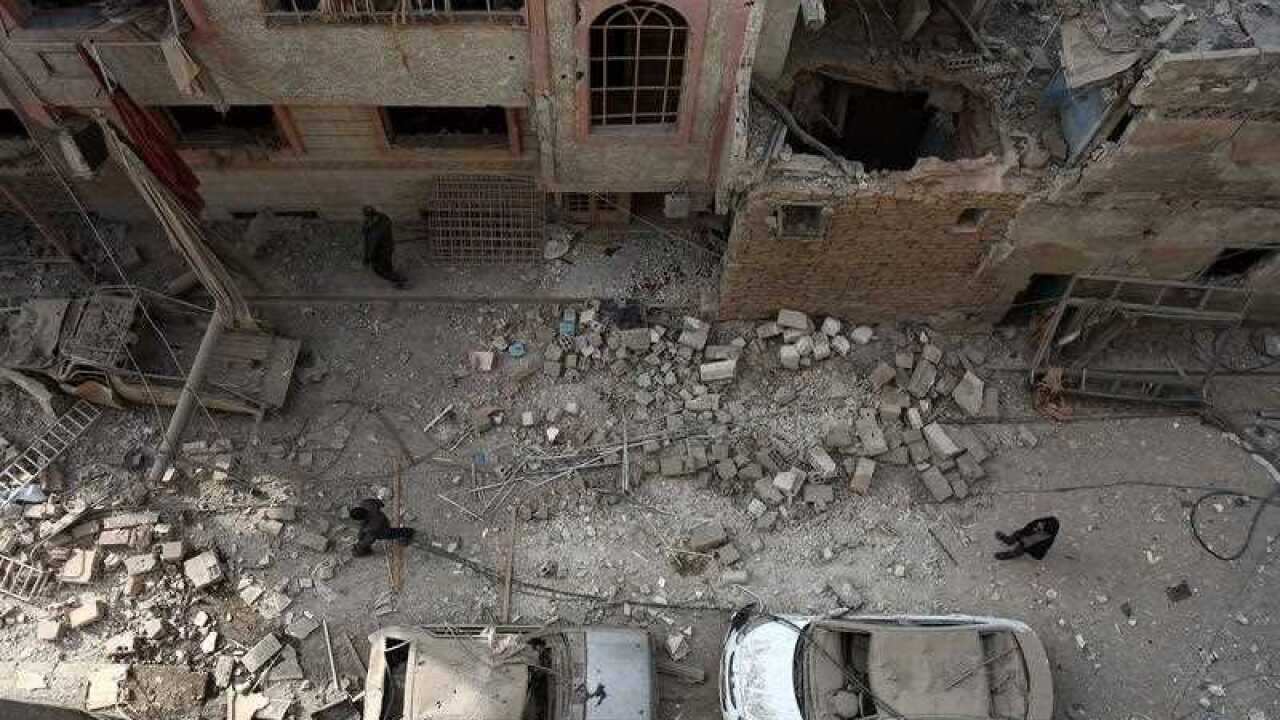 Damaged area following airstrikes - Syria