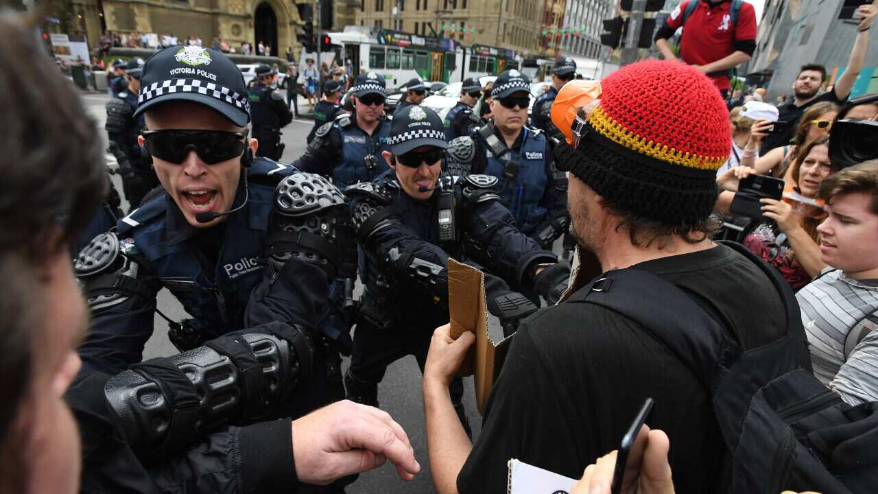 Victorian police clash with protestors at a demonstration to protest the treatment of refugees on Manus Island.