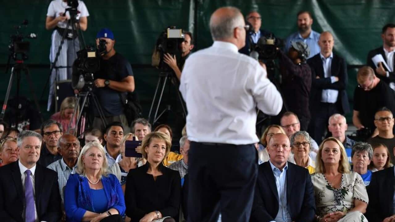 Scott Morrison in front of cabinet ministers at a Brisbane rally.