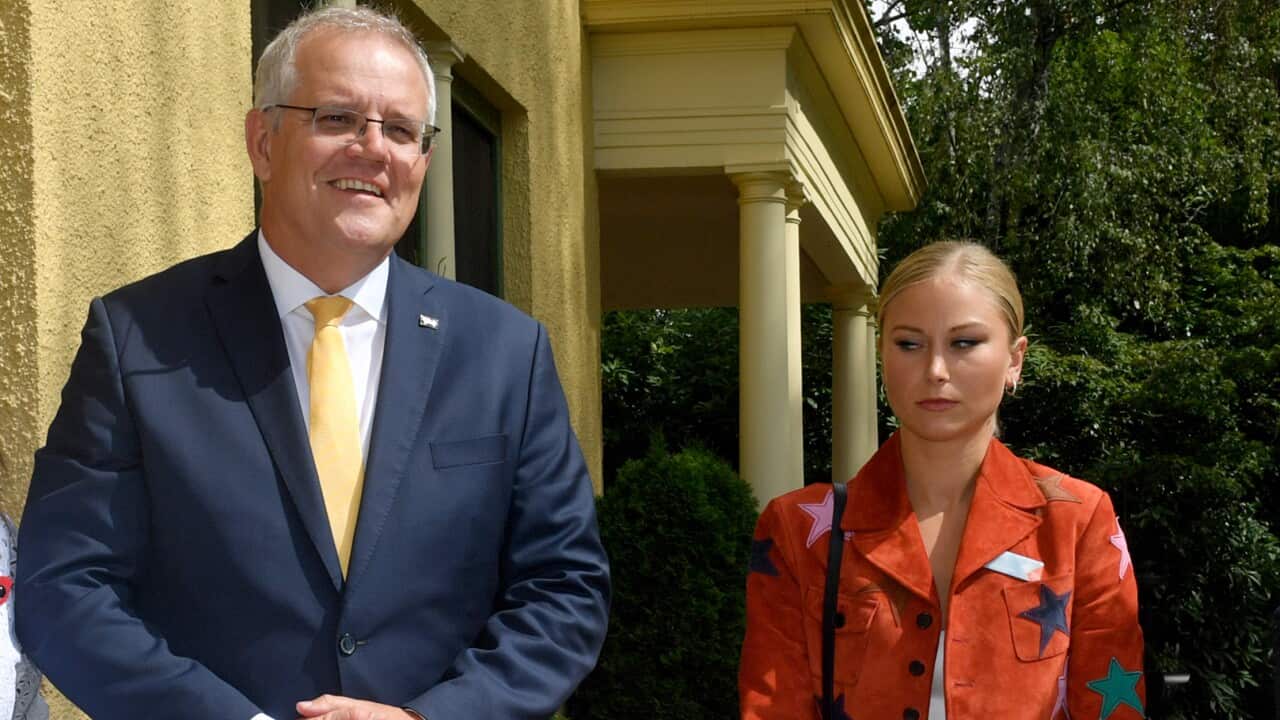 Prime Minister Scott Morrison and 2021 Australian of the Year Grace Tame during a morning tea for state and territory recipients in the 2022 Australian of the Year Awards at The Lodge in Canberra, Tuesday, January 25, 2022.