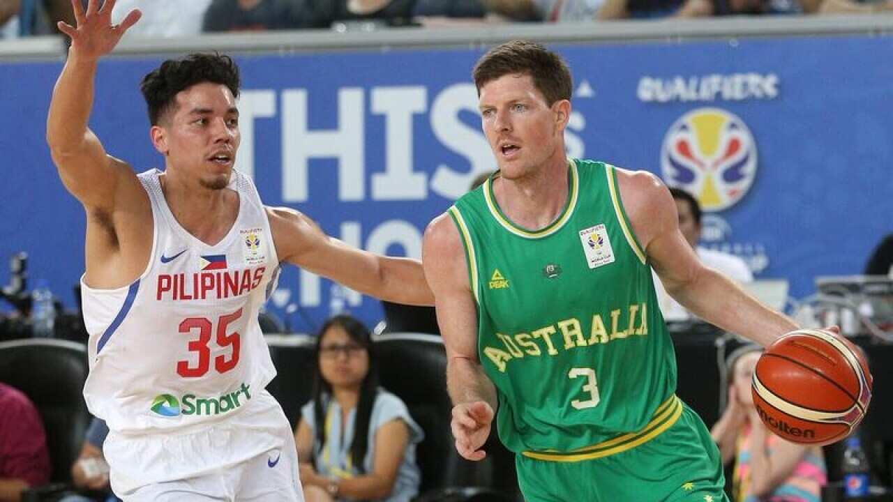 Cameron Gliddon of Australia (R) and Matthew Wright of Philippines