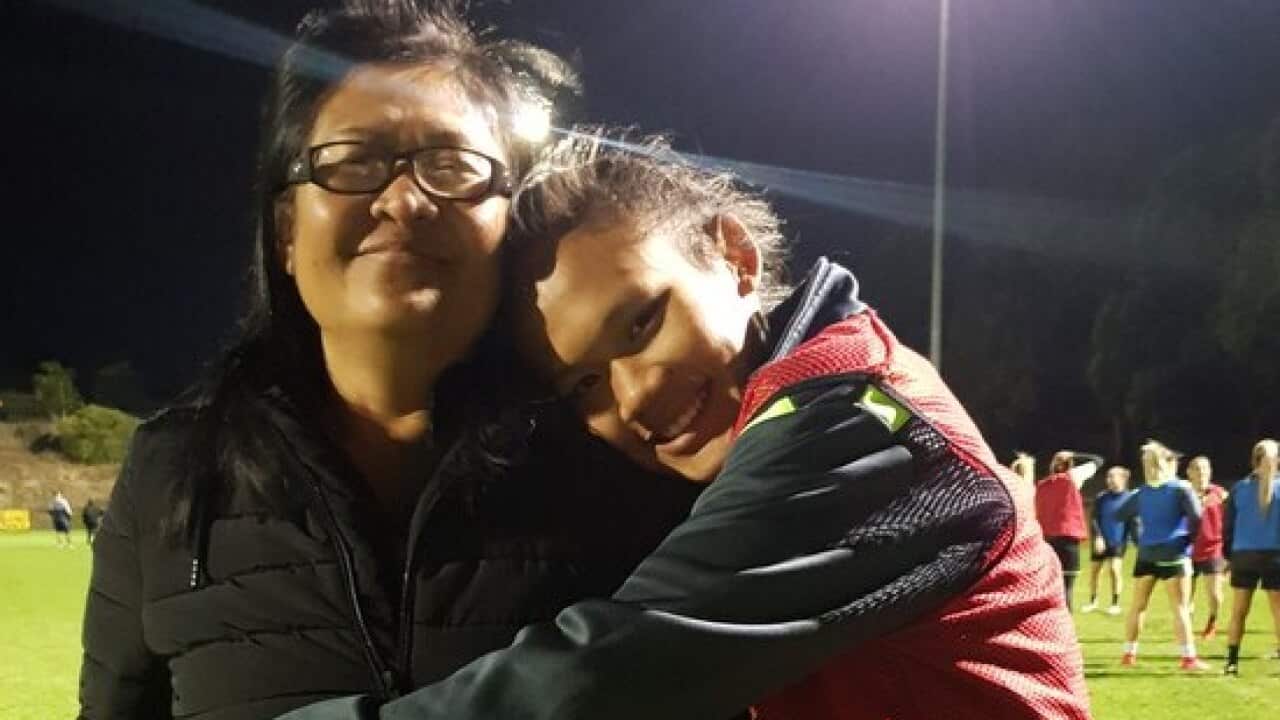 Rising football star Susan Phonsongkham and her mother Narumol Sultana