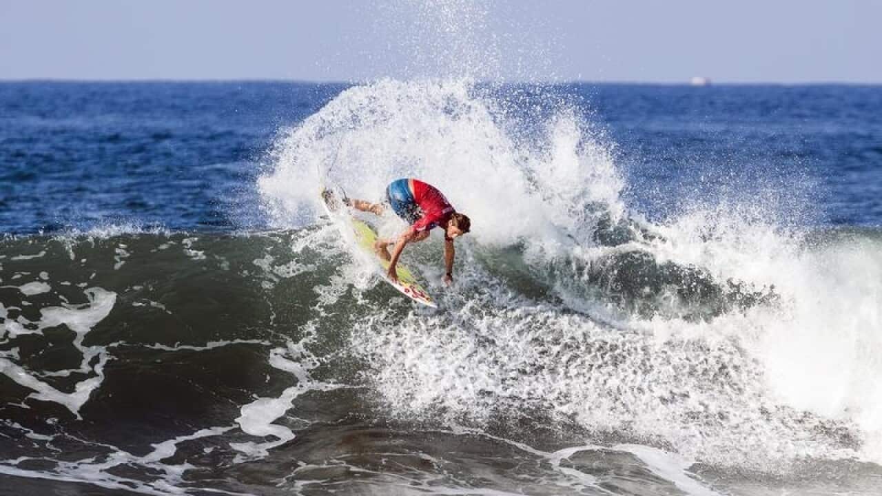 Supplied image of Australian surfer Matt Wilkinson in action in Bali.