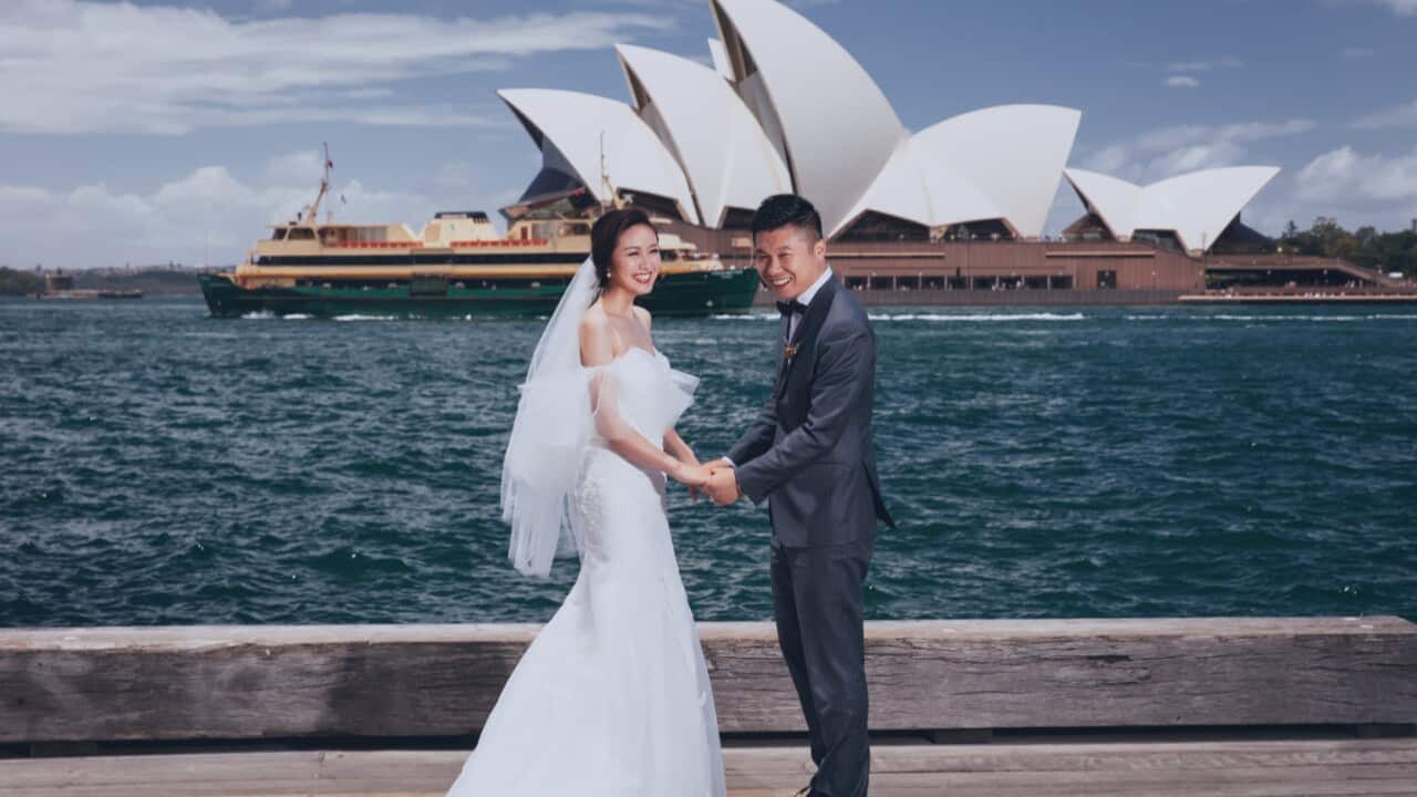 Pre-wedding photos in front of the iconic Sydney Opera House is a popular choice. 
