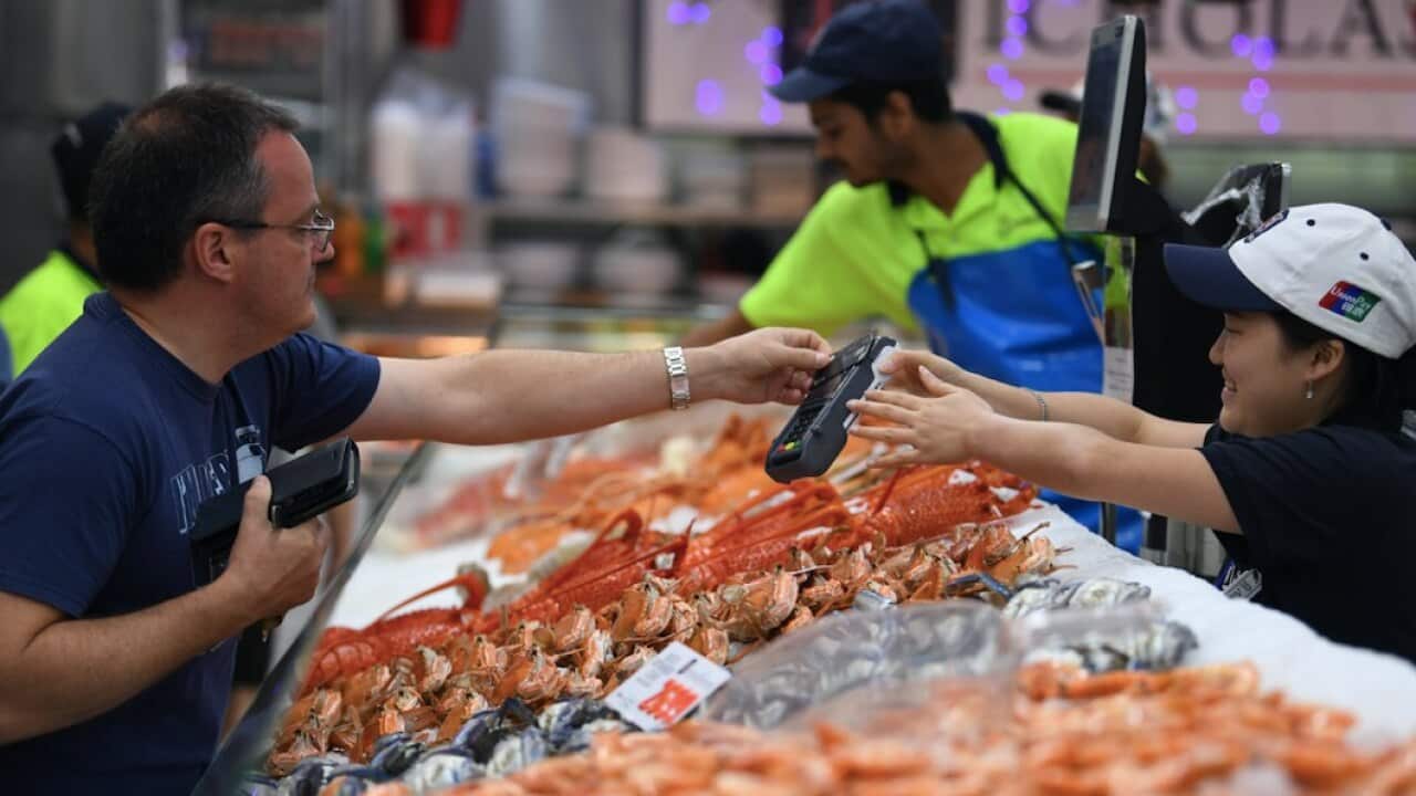 Crowds buying their Christmas Day seafood during the annual 36-hour seafood marathon at Sydney Fish Market in Pyrmont, Sydney, Monday, December 23, 2019