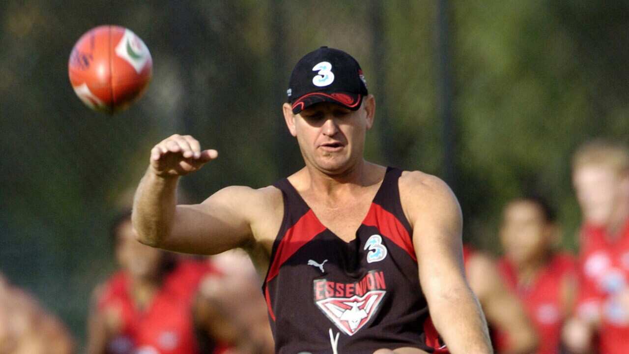Melbourne, April 13, 2005. Essendon runner John Barnes trains with the Bombers at Windy Hill this afternoon. Barnes was today suspended from acting as a runner for two weeks after he breached on-field regulations. (AAP Image/Julian Smith) NO ARCHIVING