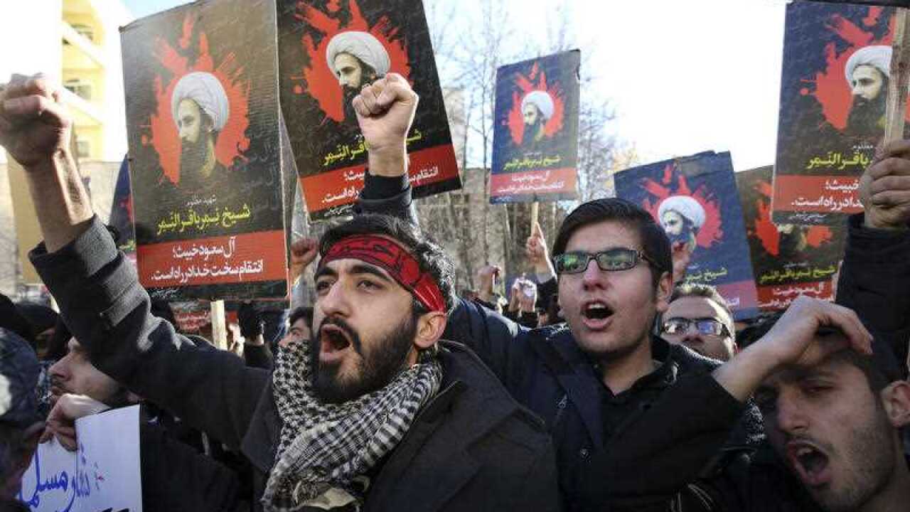 Iranian demonstrators chant slogans during a protest denouncing the execution of Sheikh Nimr al-Nimr, a prominent opposition Shiite cleric in Saudi Arabia