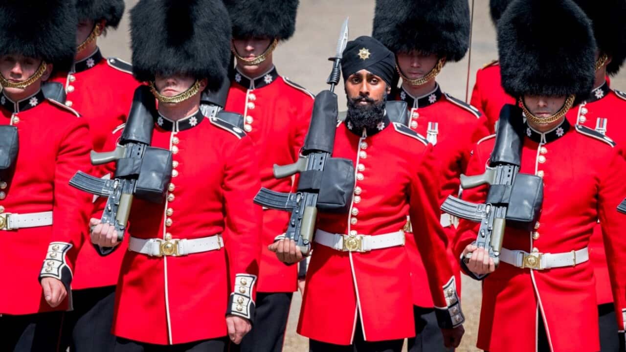 Charanpreet Singh Lall, second right, one of the Coldstream Guards marches, during the Trooping the Colour ceremony at Horse Guards Parade