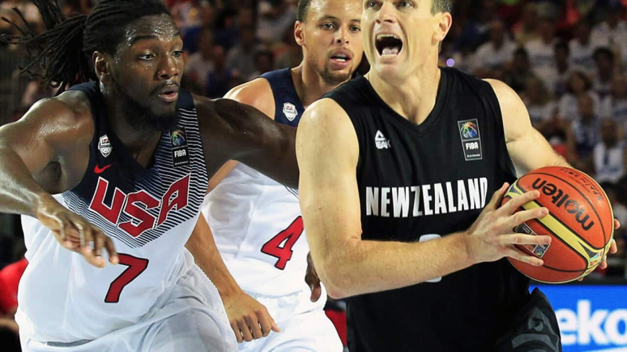 Kirk Penney (R) of New Zealand