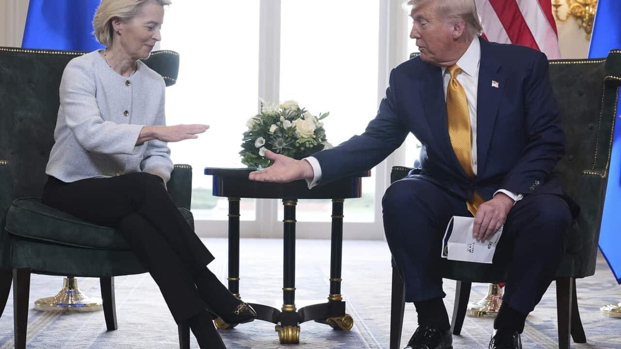 President Donald Trump and European Commission President Ursula von der Leyen shake hands (AAP)