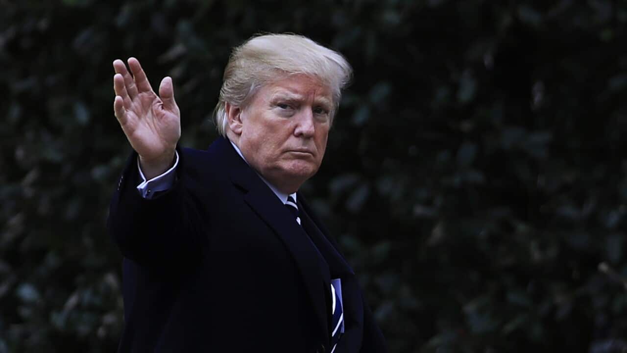 President Donald Trump waves as he walks towards the Oval Office upon arrival at the White House in Washington, Thursday, Feb. 1, 2018. (AP Photo/Manuel Balce Ceneta)