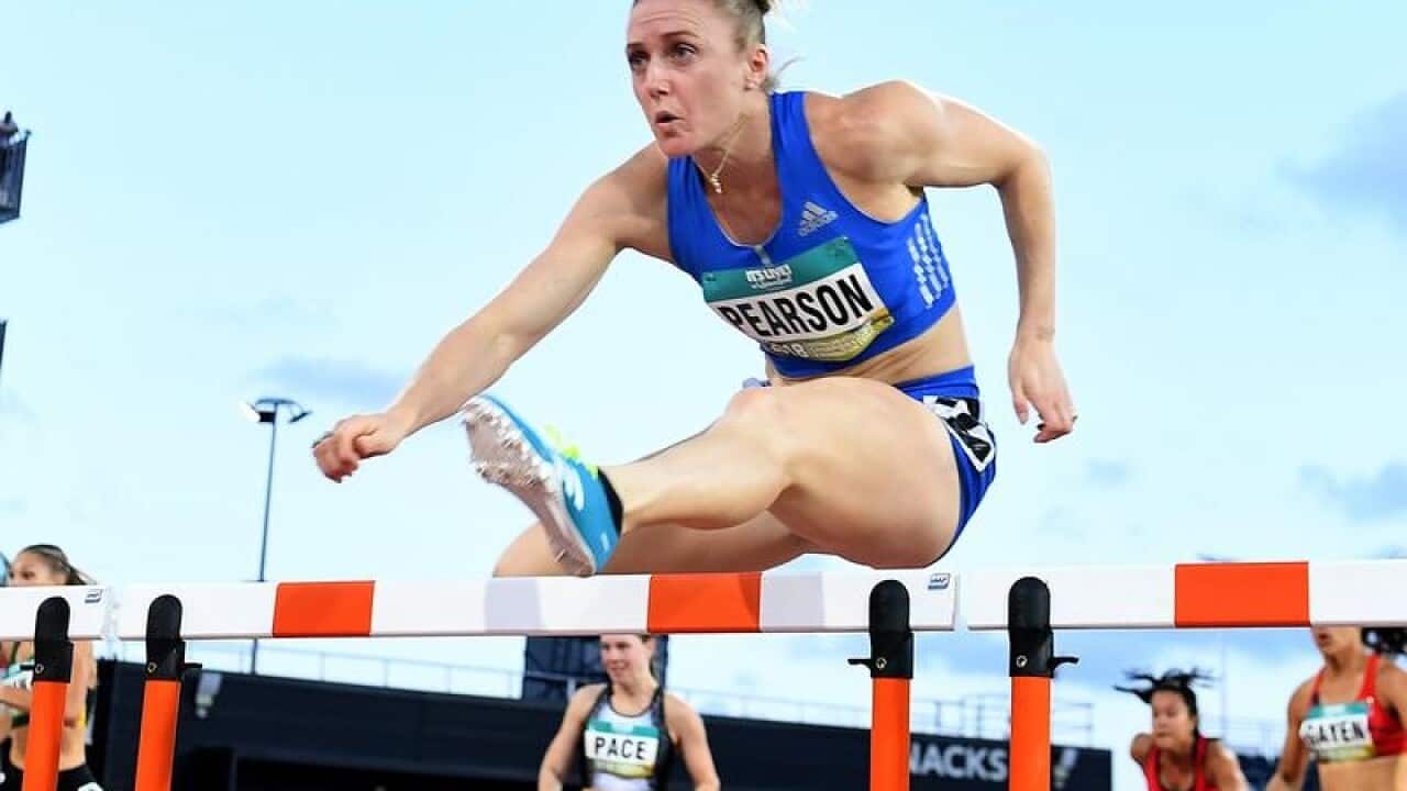 Sally Pearson leaps over a hurdle at the Aus Athletics Championships.