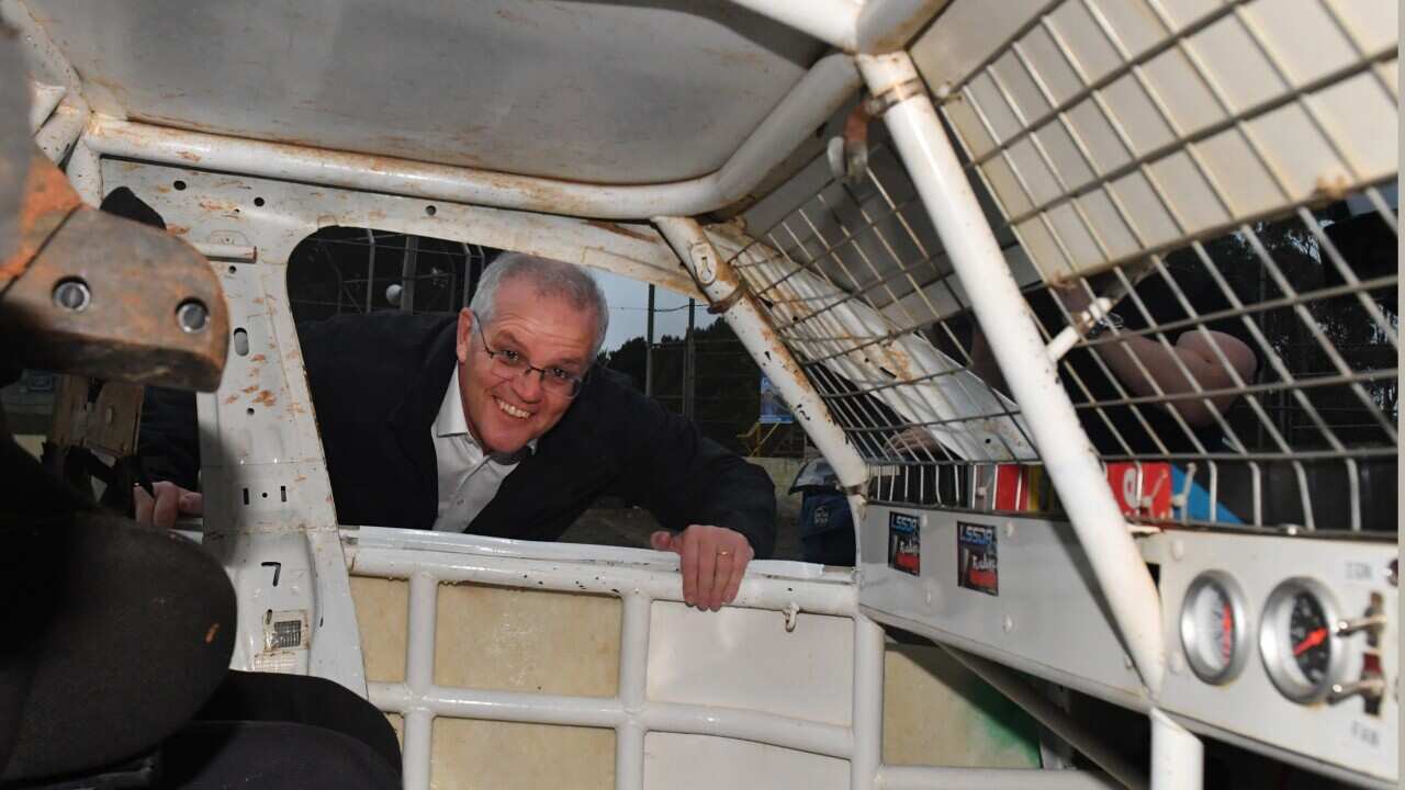 Scott Morrison looking through car window